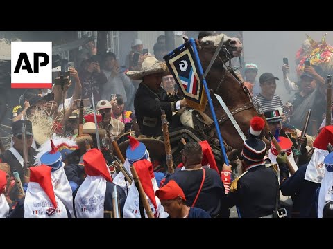 Annual recreation of Cinco de Mayo victory by Mexican troops over invading French forces