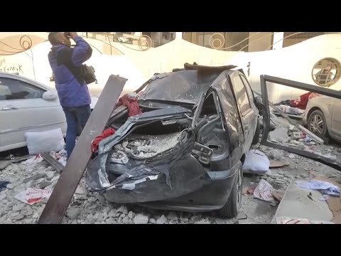 Aftermath in Damascus neighborhood, after Syrian state TV reported Israeli strikes hit the area