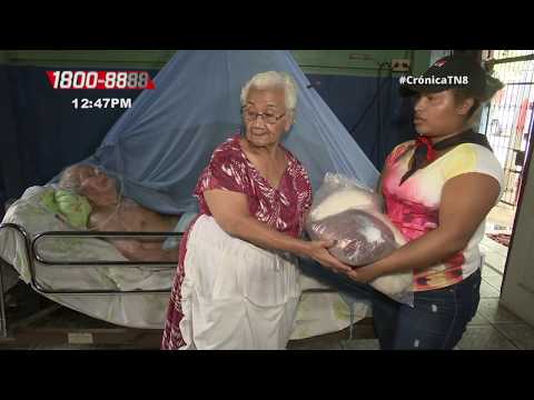 Gobierno entrega paquetes con alimentos a familias del barrio San Judas - Nicaragua