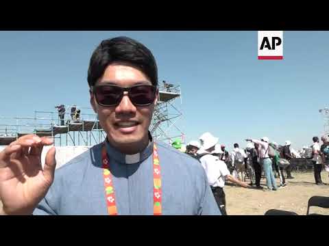 Pilgrims react to pope's Mass, SKorea announcement
