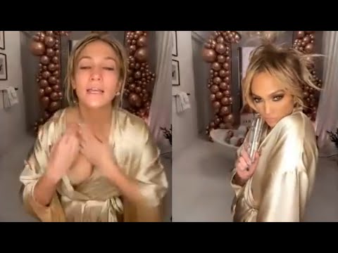 Jennifer Lopez's Wardrobe Malfunction As Robe Opens During Her Live