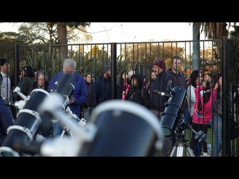 Argentines participate in a moon observation event at planetarium in Buenos Aires