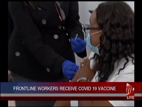 Frontline Health Workers Receive COVID-19 Vaccines