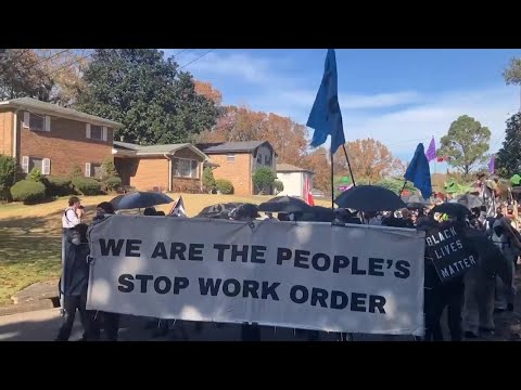 Protesters march, chant at Atlanta training center site that critics deride as 'Cop City'
