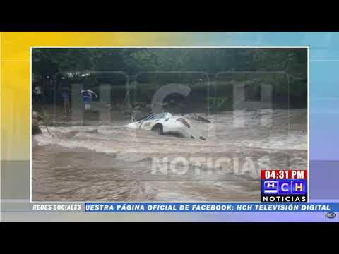 Taxi es arrastrado por la fuerte corriente de un río en Santa Fe, Colón