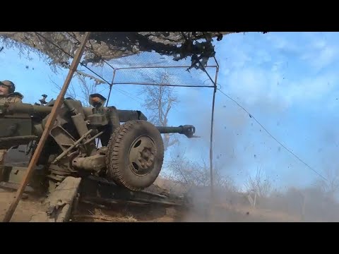 As ammunition is in low supply, Ukrainian artillerymen try to hold their positions