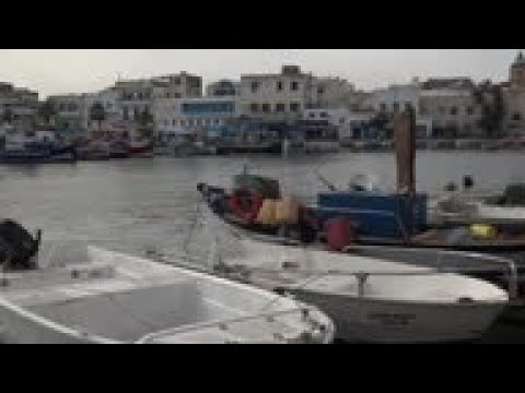Tunisians fleeing economy cause tension in Italy
