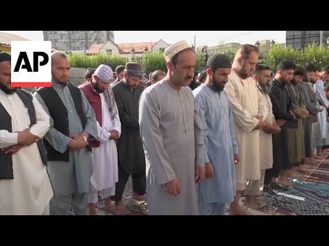 Afghans mark first day of Eid with prayers