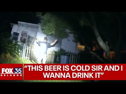 Florida man cracks open beer as they have guns drawn at him