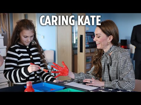 Adorable moment Kate gets her palm PAINTED as she meets brave kids affected by devastating illness