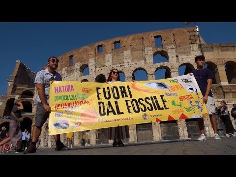 Climate activists stage anti-fossil fuel protest in front of Colosseum in Rome