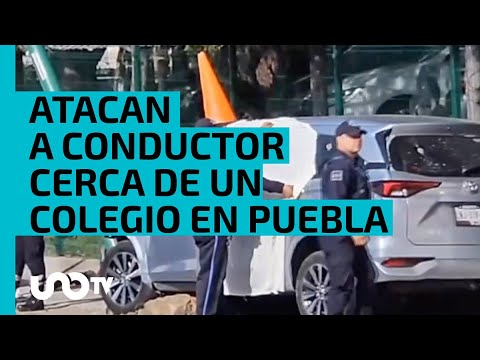 Atacan a conductor frente a colegio en San Pedro Cholula, Puebla; adolescente pierde la vida