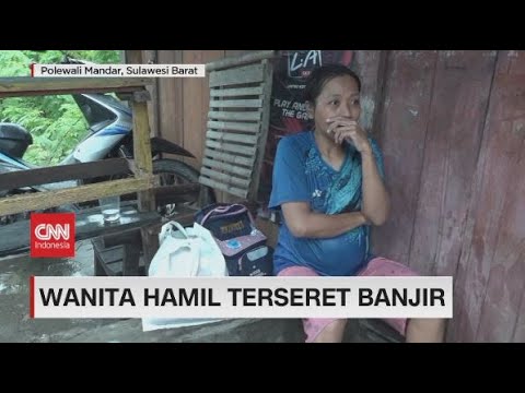 Wanita Hamil Terseret Banjir