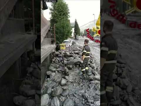 River bursts through wall flooding Italian street