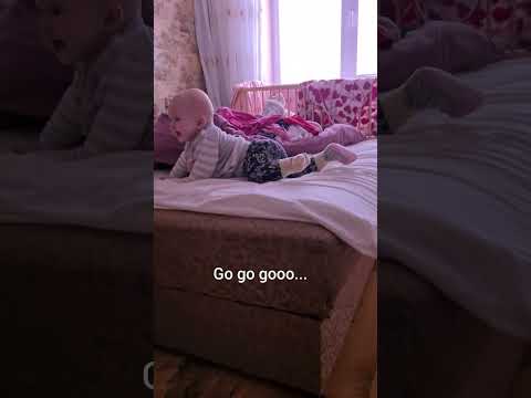 9 month old baby climbs off the bed #shorts