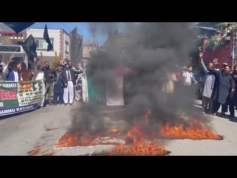 Pakistan protesters set fire to Israeli flag during rally in support of Palestinians