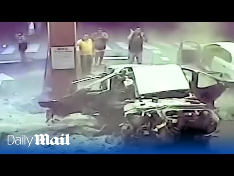 Terrifying moment car stashed with $1,500,000 worth of cocaine blows up in petrol station