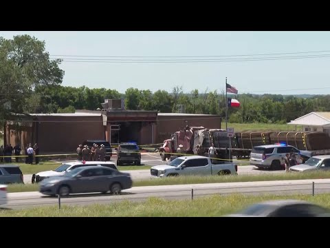 Semitrailer intentionally crashed into Texas public safety office leaving 1 dead and 13 injured