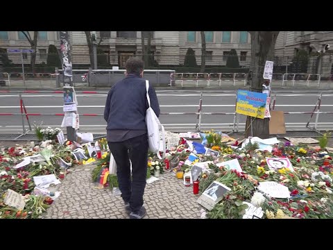 People place flowers outside Russia embassy in Berlin as opposition leader Navalny is buried in Mosc