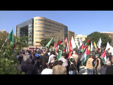 Palestinian refugees and Lebanese supporters march in Beirut in support of Gaza