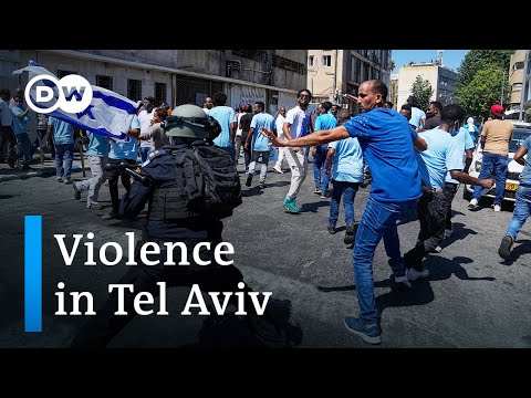 Dozens injured in clashes between Eritrean migrants in Tel Aviv | DW News