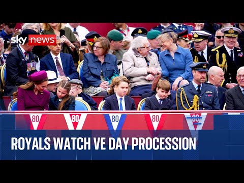 Royal Family and PM join WWII veterans to watch military procession