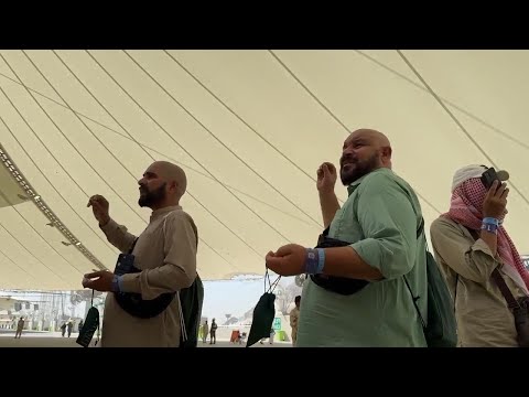 Muslim pilgrims continue the ritual of stoning the devil at Hajj