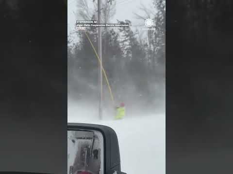 Michigan Utility Workers Battle Blizzard to Restore Power!