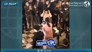 ضرب الكفوف بين سيدات