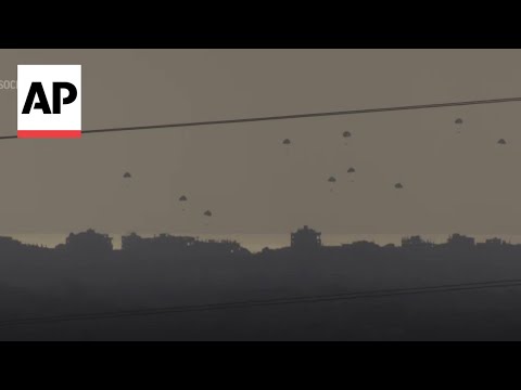Aid drops into Gaza and smoke seen from direction of Rafah