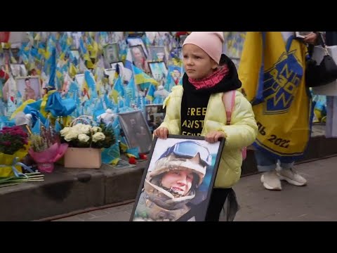 Ukrainians commemorate fallen soldiers on national Defenders Day