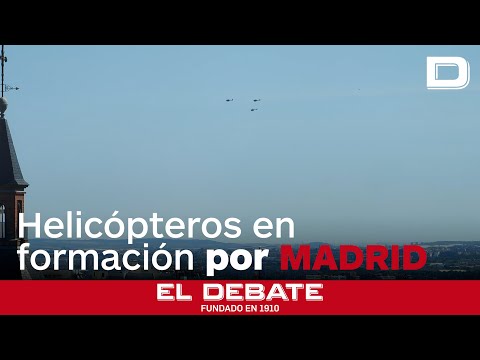 Tres helicópteros de la Policía Nacional en perfecta formación surcan los cielos de Madrid