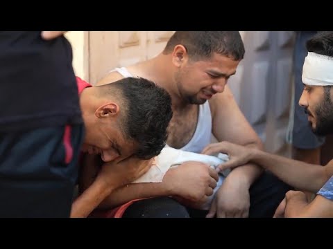 Distraught Palestinian father cries over lifeless body of baby son killed in Israeli airstrike in Ga