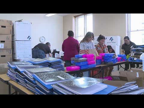 City workers help prepare school supplies for Denver Days