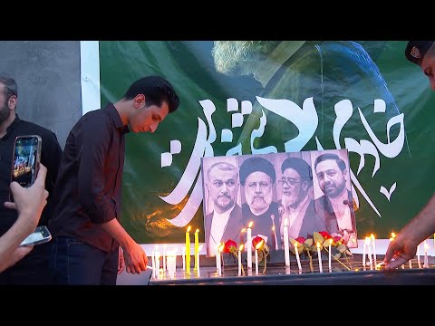 Mourners pay tribute to Raisi outside Baghdad's Iranian embassy