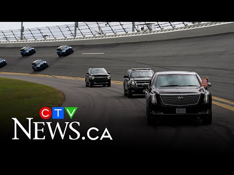 Trump's presidential limousine motorcade loops around Nascar's Daytona 500 racetrack