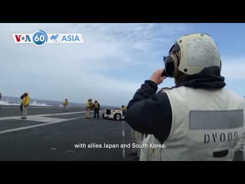 VOA60 Asia  - Biden, leaders of Japan, Philippines discuss Beijing’s aggression in South China Sea