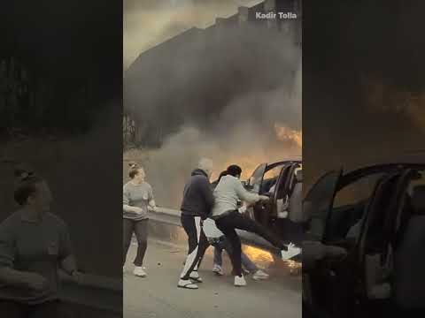 WHOA! Good Samaritans save driver from burning car