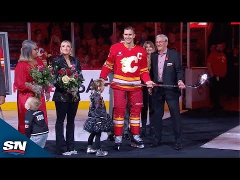 Flames Present Mikael Backlund With Silver Stick In Honour Of 1,000 Games