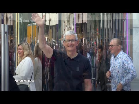 Apple CEO Tim Cook in NYC greets customers buying new iPhone 16 with ‘Apple Intelligence’