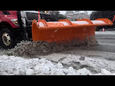 Rhode Island residents deal with winter storm that dumped heavy, wet snow