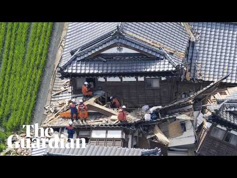 'There are people waiting to be rescued': race under way to find Japan quake survivors