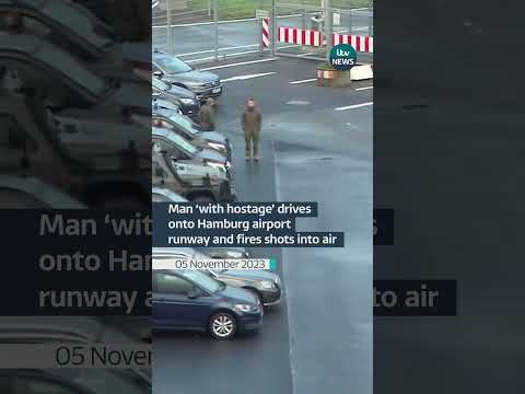 Hamburg airport closed after man 'with hostage' drives onto runway and fires shots into air