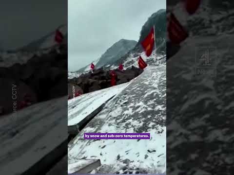 At least 20 dead and dozens missing after China landslide