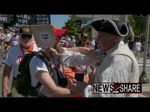 Pro-ICE Paul Revere reenactor attempts to enter anti-Trump veteran's march in Philadelphia