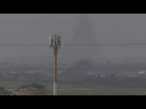 Smoke seen rising on the Gaza skyline from southern Israel