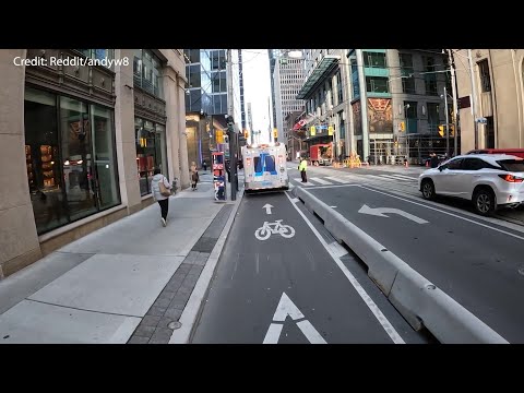 Toronto ambulance forced to use bike lane to avoid traffic