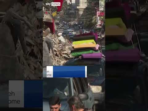 Displaced people return to destroyed city