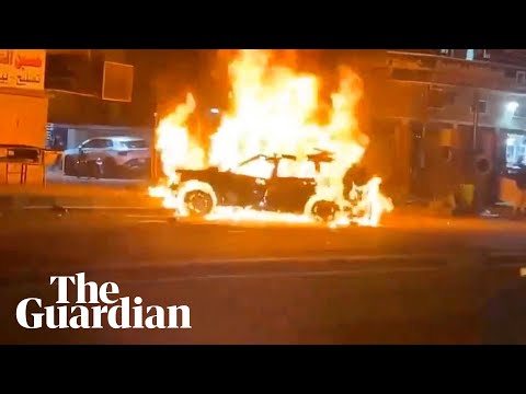 Flames engulf car in Baghdad after US drone strike