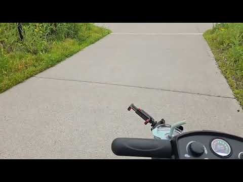 SCOOTING AROUND